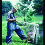 Fisherman Jep Mackey, of Hancock County, ties a fishnet for use in the Clinch River.  Photo by Robert Cogswell, 1985.