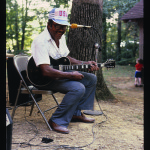 Marble-maker and bluesman Bud Garrett, of Free Hill, performs at the National Rolley Hole Marble Tournament.  Photo by Robert Cogswell, 1985.