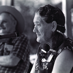 Parks Townsend (left) enjoys a story by Ethel Birchfield, of Hampton, at the David Crockett Days festival in Chuckey.  Photo by Robert Cogswell, 1986.