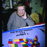 Hungarian-American needleworker Clara Fodor, of Linden, with her embroidered tribute to the United States.  She received the Tennessee Folklife Heritage Award in 2003.  Photo by Robert Cogswell, 1999.