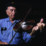 Ralph Blizard, recipient of the National Heritage Fellowship in 2002 and the Tennessee Folklife Heritage Award in 2003, fiddles at the Blountville jam.  Photo by Robert Cogswell, 2001.