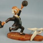 The Race is On!!!, n.d.
Wood carving, 9 ¼ x 12 x 4 ½ inches