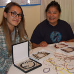 Apprentice Madison Dean and Master Sally Wells show off their Choctaw beadwork.