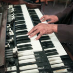 Willie Artison, bandleader for the legendary Bell Singers in Memphis, demonstrates his keyboard playing, in May 2018.