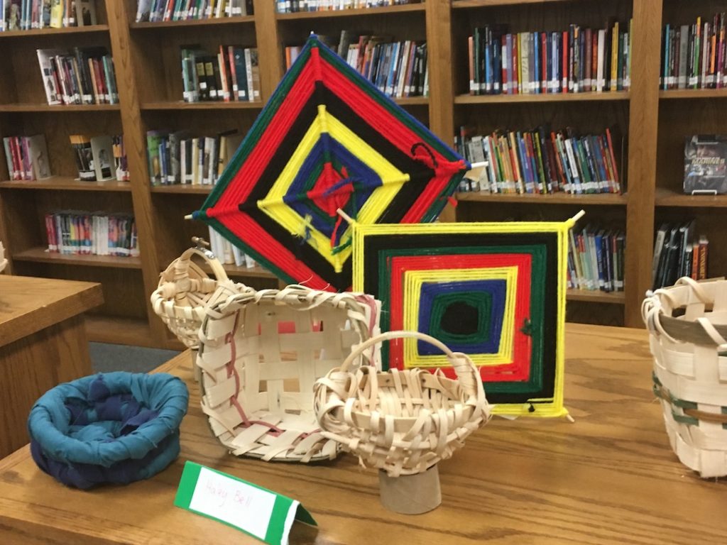 student made baskets and God's eye