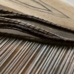 earthen pigments, coffee, thread, and Pine needles on canvas, 24 x 36 x 1.5 inches