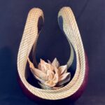 Sweetgrass coiling on a gourd, with a pod cluster as center stage, 22 x 17 x 16 inches