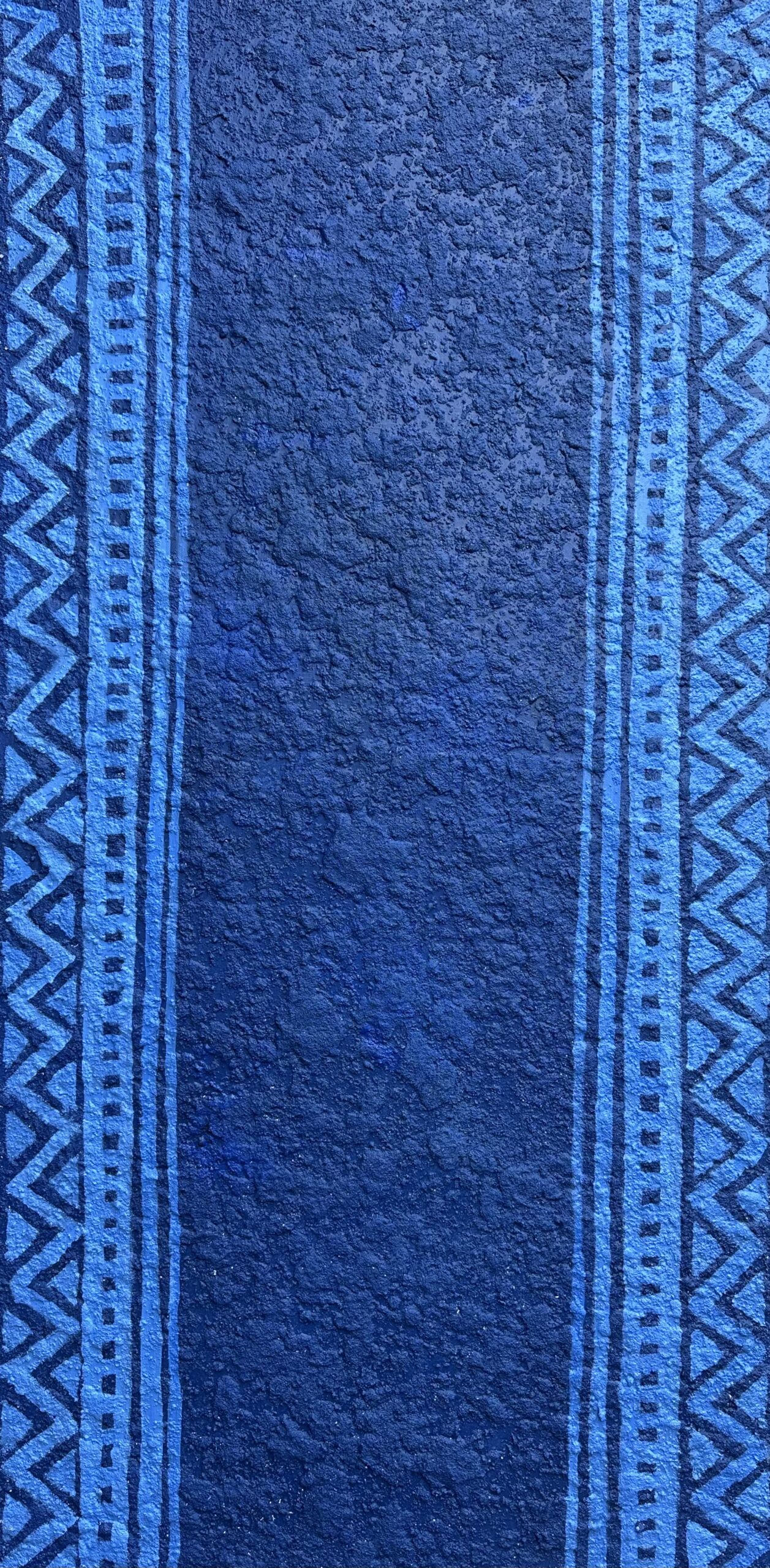 Akintayo Akintobi, Blue Wall, 2025, sand, gesso, and acrylic on canvas, 24 x 48 inches