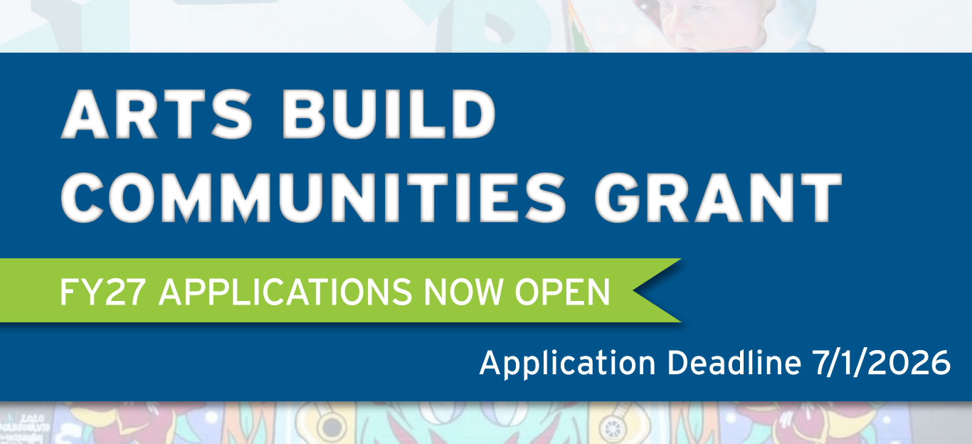 Blue banner with white text reading Arts Build Communities Grant. A green ribbon states FY27 Applications Now Open. White text at the bottom right says Application Deadline 7/1/2026. Colorful artwork is partially visible behind the banner.