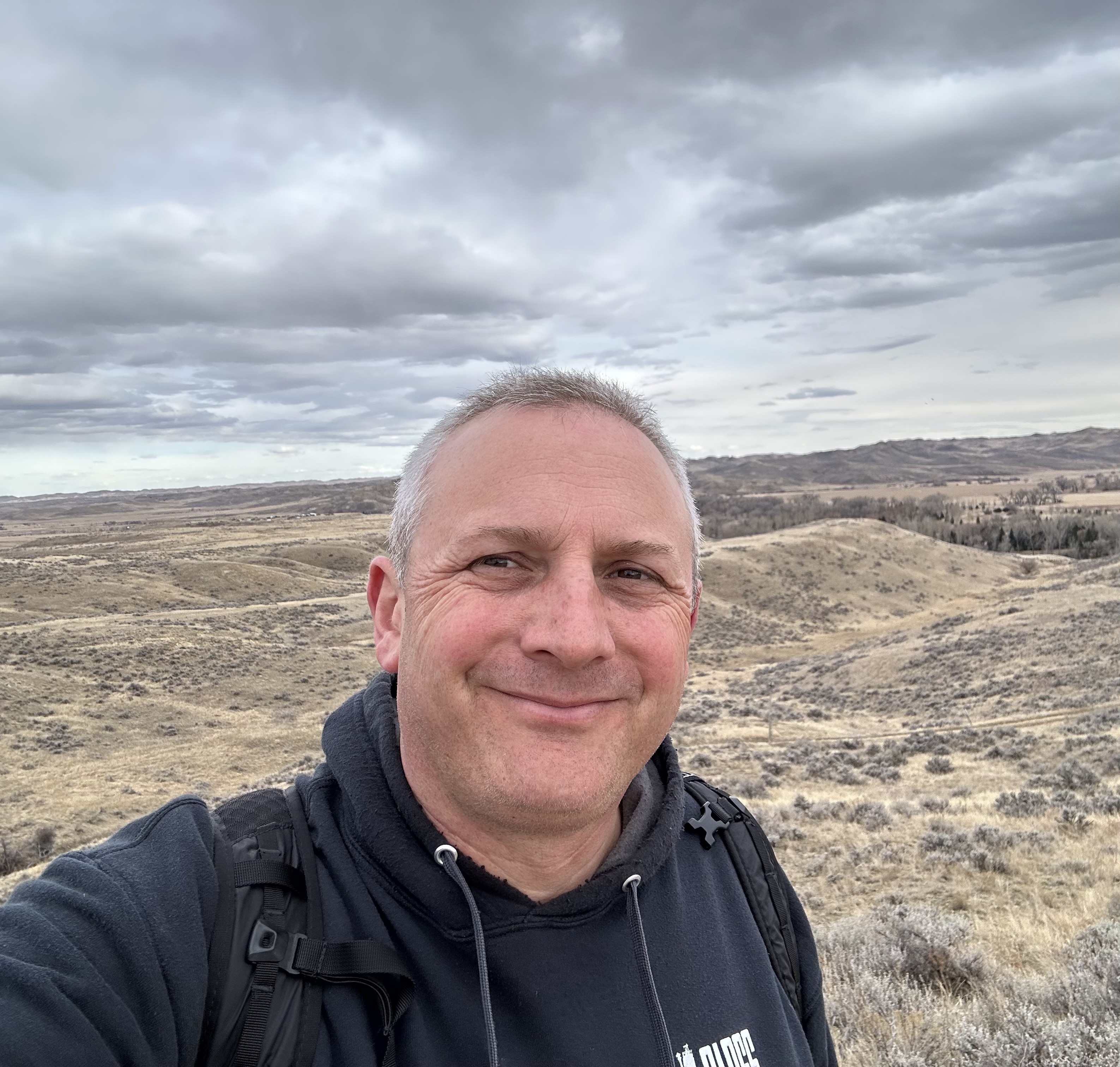 Jason Sheridan Brown outdoors in an open landscape